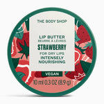 The Body Shop's Strawberry lip butter container on a white background